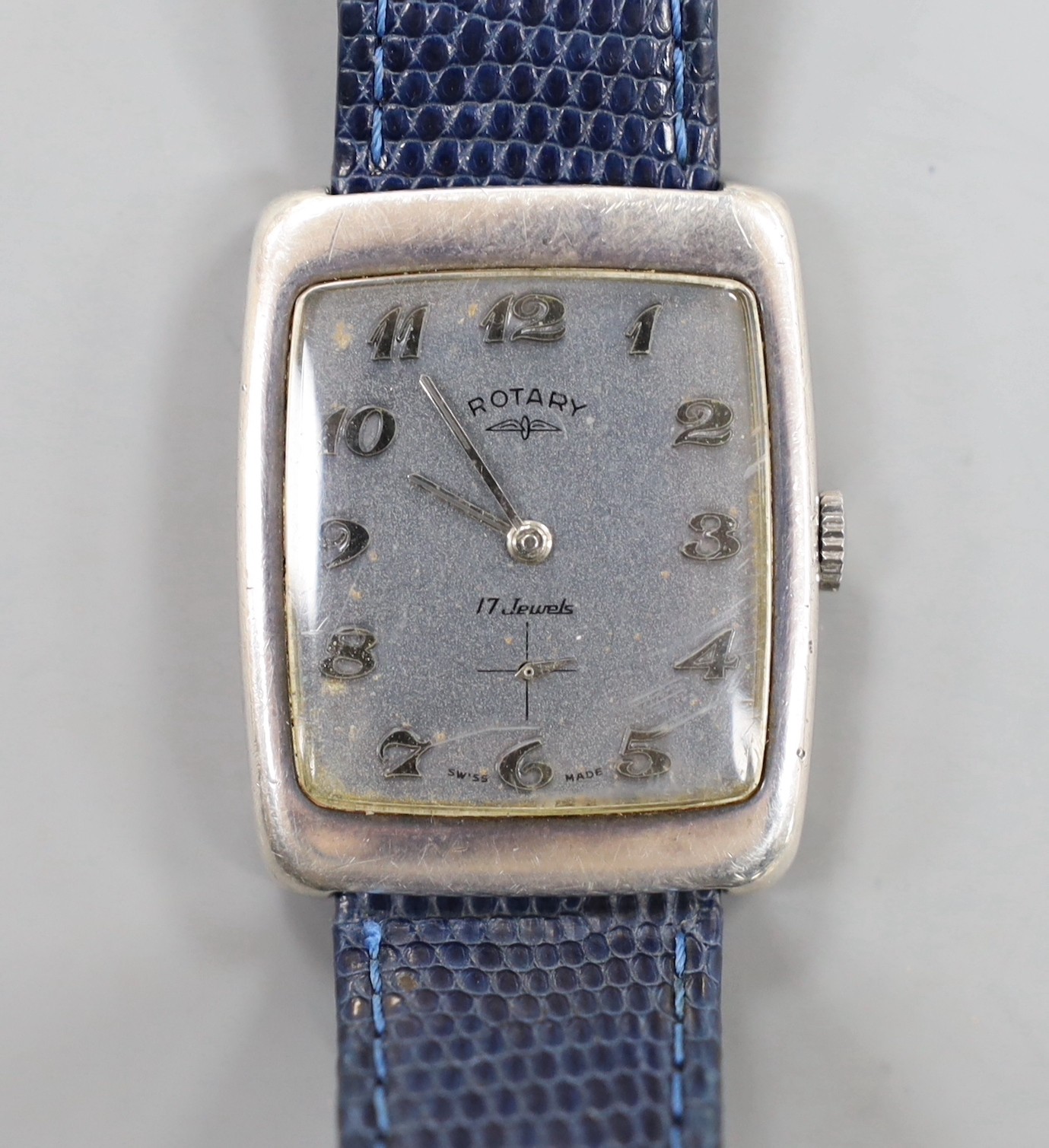 A gentleman's 1970's silver Rotary manual wind wrist watch, with Arabic dial, on associated leather strap, case diameter 30mm, no box or papers.